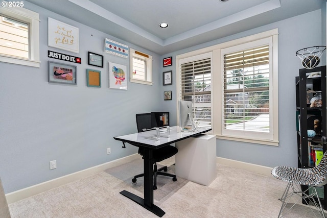 office with carpet flooring, baseboards, and plenty of natural light