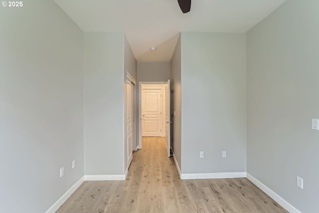 unfurnished bedroom with light wood-style floors and baseboards