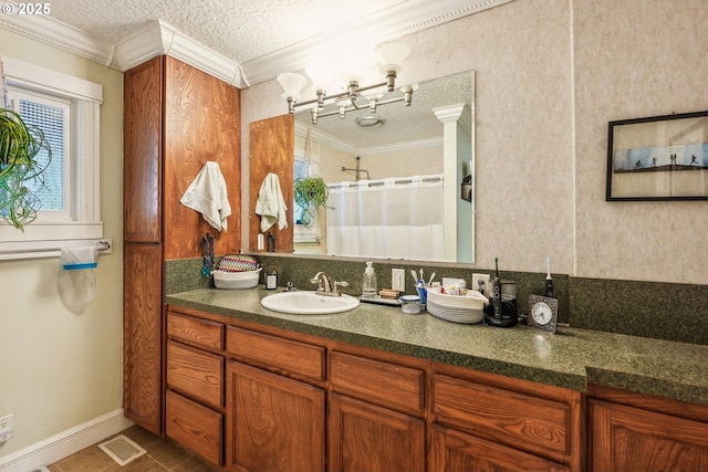 bathroom with crown molding, vanity, a textured ceiling, and a shower with shower curtain