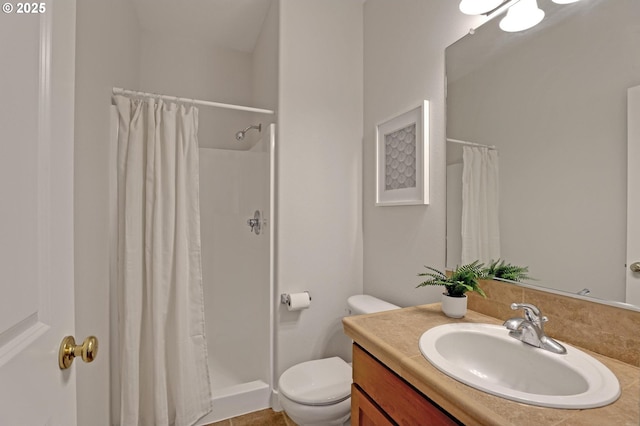 bathroom with vanity, a shower with curtain, and toilet