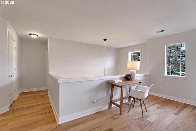 office area with light wood-type flooring