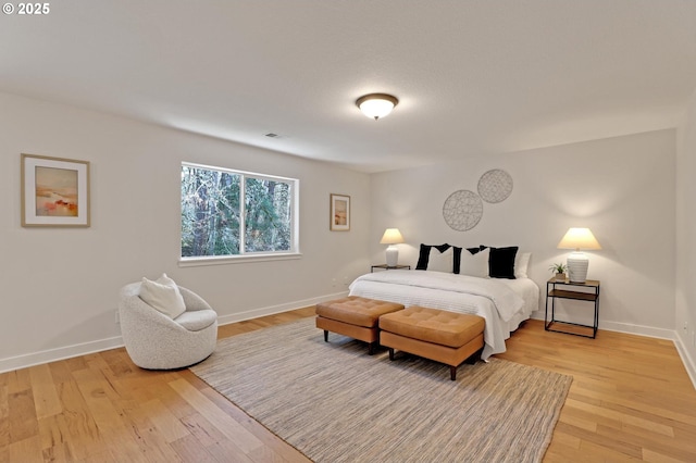 bedroom featuring light hardwood / wood-style floors