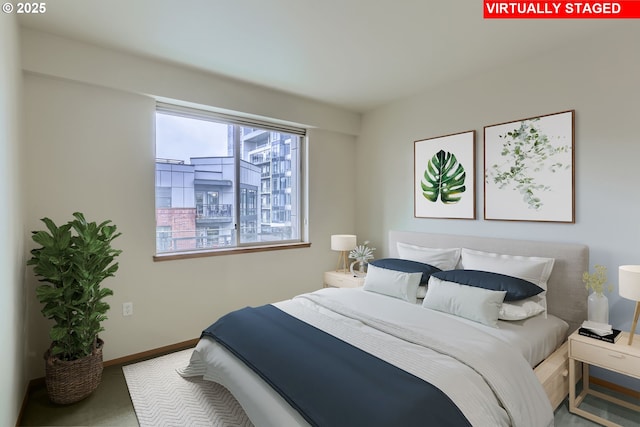 bedroom featuring baseboards