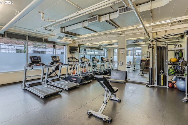 workout area with plenty of natural light and visible vents