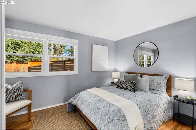 bedroom featuring hardwood / wood-style floors