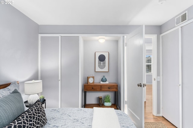 bedroom featuring light hardwood / wood-style floors