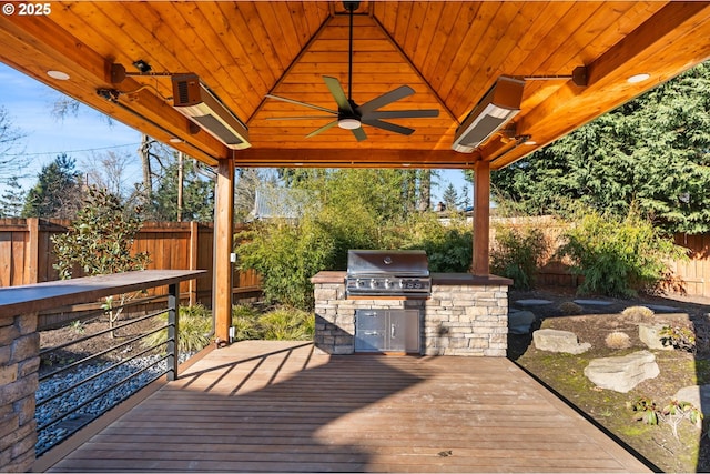 deck with grilling area, area for grilling, and ceiling fan