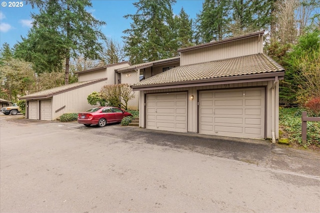 7148 SW Murray Blvd, Beaverton, OR 97008 - view of front of home with a tiled roof