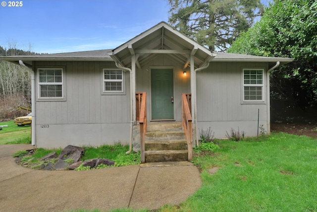 12813 Village Rd Unit 12, Swisshome, OR 97480 - view of front of house with a front lawn
