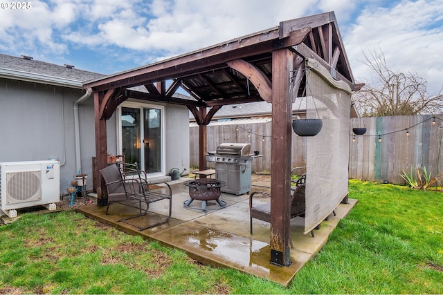 view of patio / terrace featuring ac unit, fence, grilling area, and a gazebo