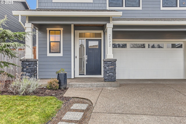 entrance to property featuring a garage