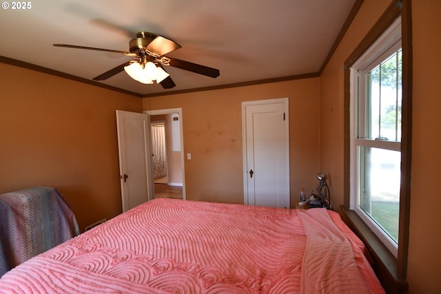 719 W 11th St, The Dalles, OR 97058 - bedroom featuring ornamental molding and ceiling fan