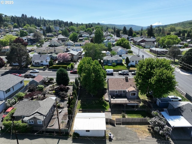 719 W 11th St, The Dalles, OR 97058 - bird's eye view featuring a mountain view and a residential view