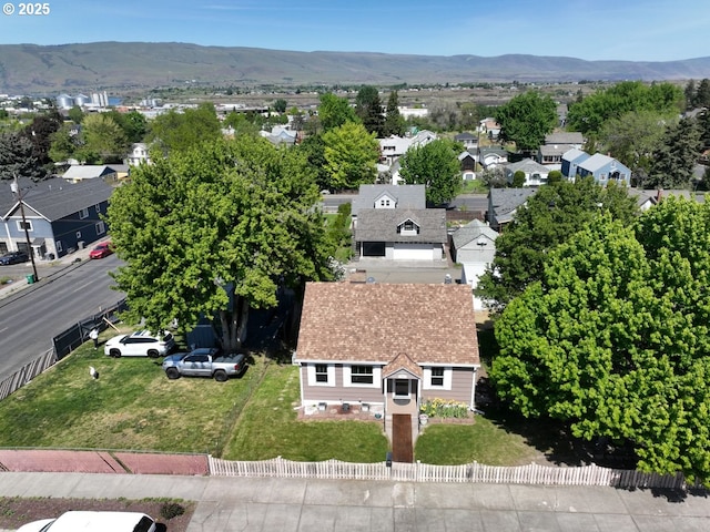 719 W 11th St, The Dalles, OR 97058 - drone / aerial view featuring a mountain view and a residential view