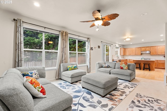 20053 SW 54th Ter, Tualatin, OR 97062 - living room featuring healthy amount of natural light, a ceiling fan, and recessed lighting