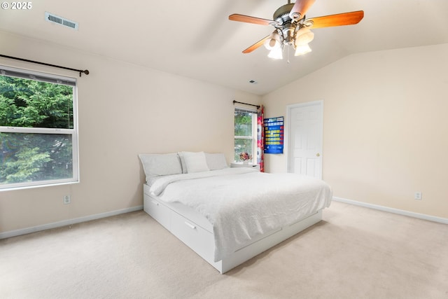 20053 SW 54th Ter, Tualatin, OR 97062 - bedroom with light carpet, vaulted ceiling, baseboards, and ceiling fan