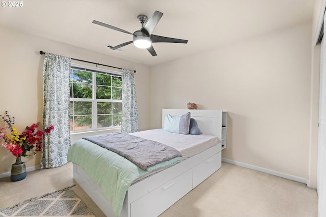 20053 SW 54th Ter, Tualatin, OR 97062 - bedroom with light carpet, baseboards, and a ceiling fan