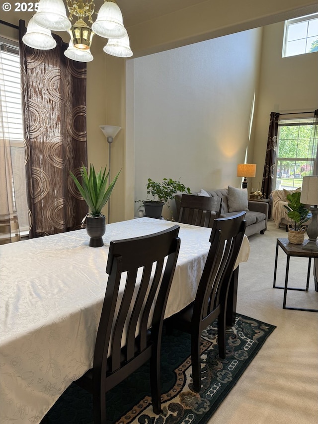 20053 SW 54th Ter, Tualatin, OR 97062 - carpeted dining space with a chandelier