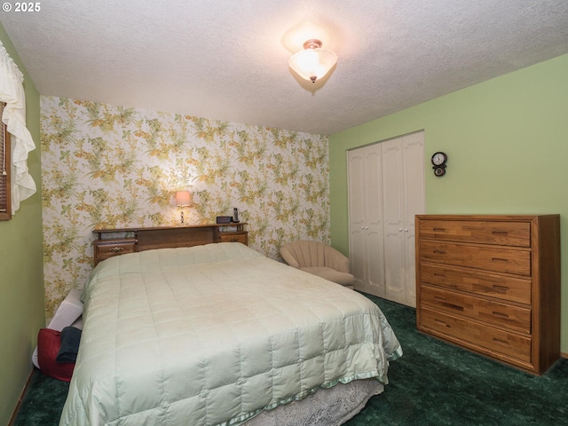 19838 NE Wasco St, Portland, OR 97230 - carpeted bedroom with wallpapered walls, a closet, and a textured ceiling