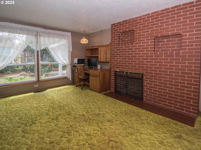 19838 NE Wasco St, Portland, OR 97230 - carpeted home office featuring a textured ceiling and a fireplace