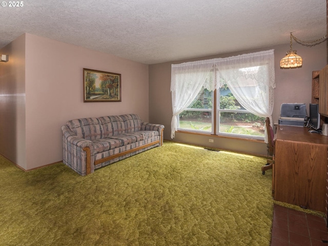 19838 NE Wasco St, Portland, OR 97230 - carpeted living area featuring a textured ceiling and a desk