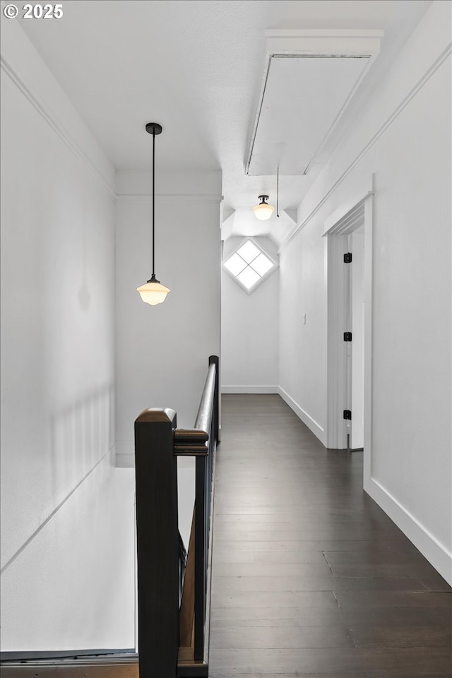 hallway featuring dark hardwood / wood-style floors