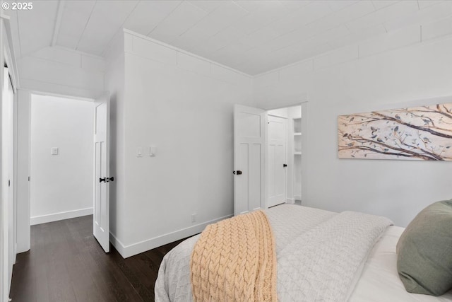 bedroom featuring dark hardwood / wood-style floors