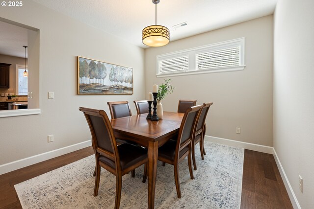 17007 NW Reuben Ln, Portland, OR 97229 - dining room with light wood-type flooring