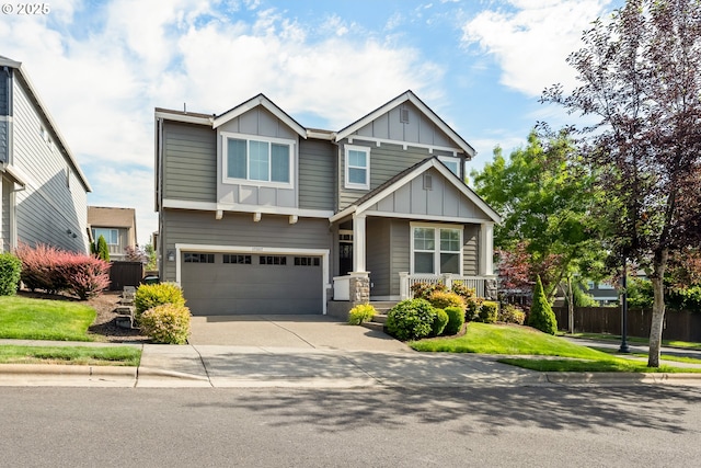 17007 NW Reuben Ln, Portland, OR 97229 - craftsman-style house featuring board and batten siding, a garage, concrete driveway, and covered porch