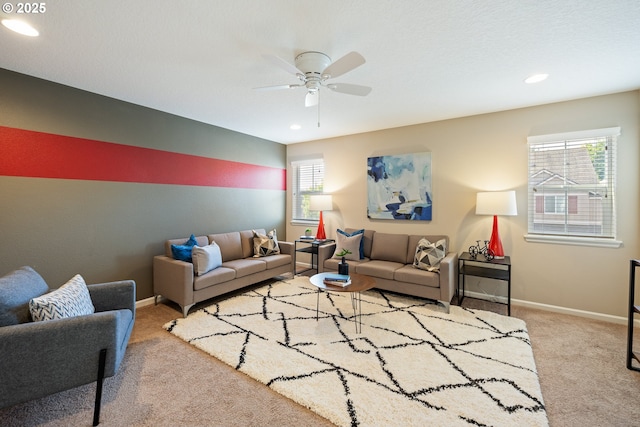 17007 NW Reuben Ln, Portland, OR 97229 - living room with carpet flooring, a ceiling fan, and recessed lighting