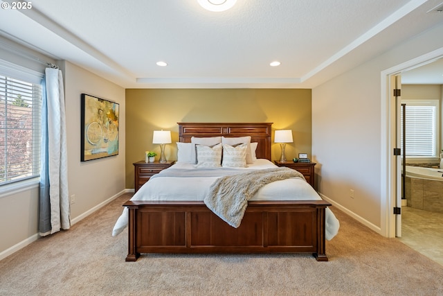 17007 NW Reuben Ln, Portland, OR 97229 - bedroom with light colored carpet, a raised ceiling, and recessed lighting