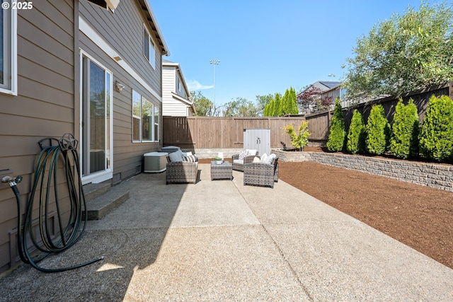 17007 NW Reuben Ln, Portland, OR 97229 - fenced backyard with a patio and an outdoor hangout area