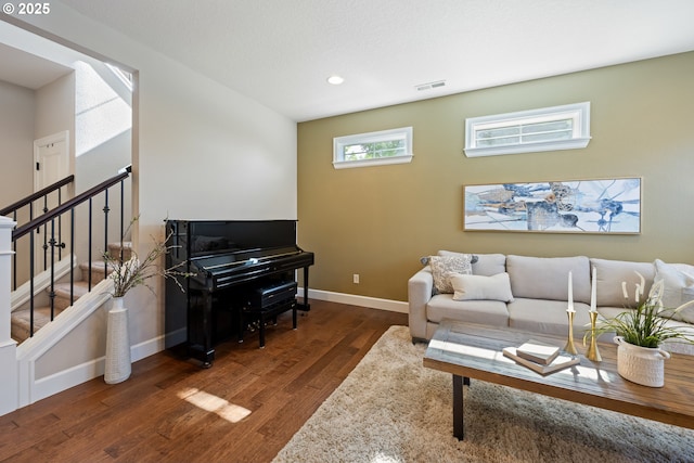 17007 NW Reuben Ln, Portland, OR 97229 - living room with wood finished floors, stairs, and recessed lighting