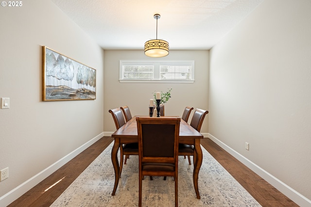 17007 NW Reuben Ln, Portland, OR 97229 - dining area with dark wood finished floors and baseboards