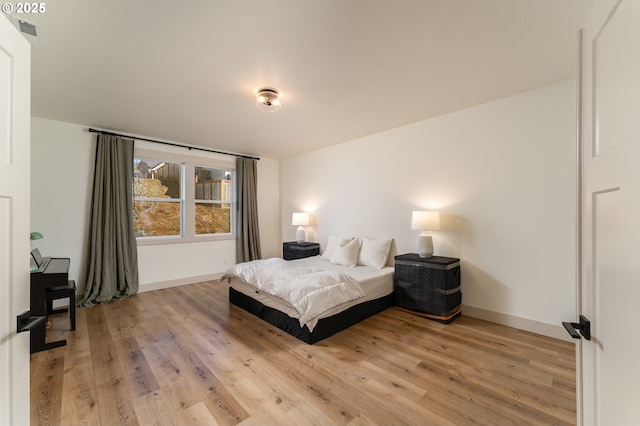 bedroom featuring light hardwood / wood-style flooring