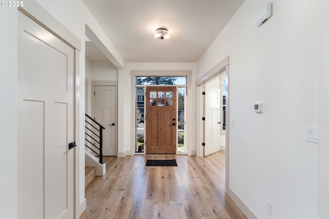 foyer featuring light hardwood / wood-style floors