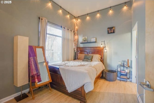 bedroom featuring light wood-type flooring