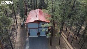 drone / aerial view with a forest view