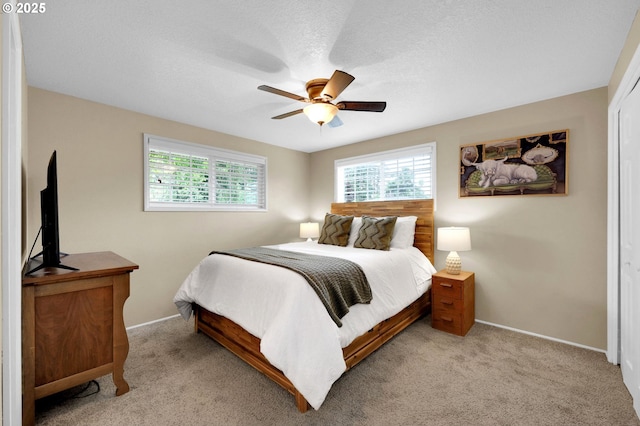 1808 S 4th St, Cottage Grove, OR 97424 - bedroom with baseboards, light colored carpet, ceiling fan, and a textured ceiling