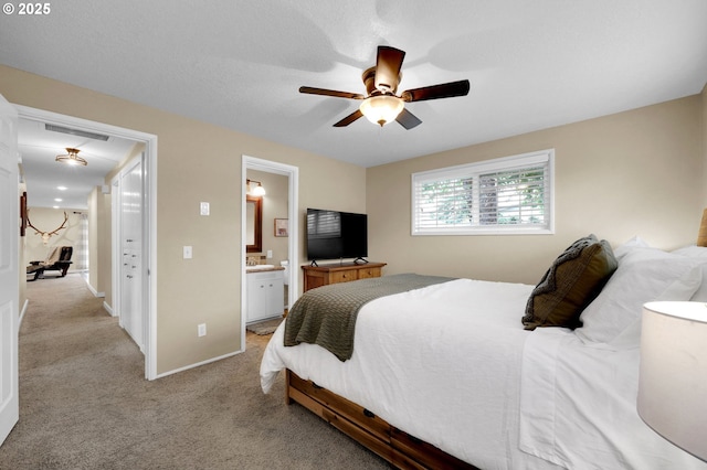 1808 S 4th St, Cottage Grove, OR 97424 - bedroom with light carpet, connected bathroom, ceiling fan, and baseboards