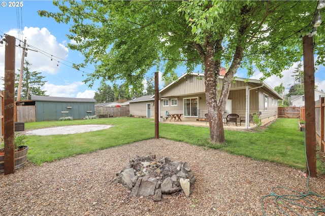 1808 S 4th St, Cottage Grove, OR 97424 - back of house with a patio and a fire pit