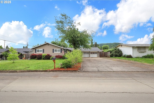1808 S 4th St, Cottage Grove, OR 97424 - ranch-style home with a front yard, asphalt driveway, and an attached garage