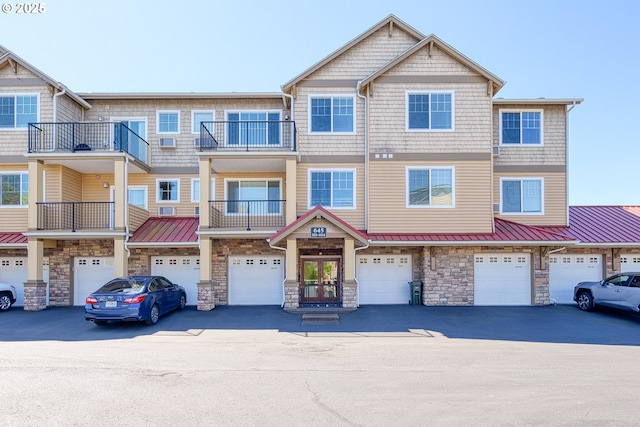 645 NW Falling Waters Ln Unit 303, Portland, OR 97229 - multi unit property featuring a garage, french doors, and stone siding