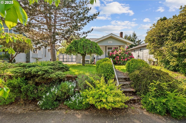 7817 N Washburne Ave, Portland, OR 97217 - view of front of home featuring a chimney