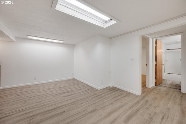 7817 N Washburne Ave, Portland, OR 97217 - spare room with baseboards and light wood finished floors
