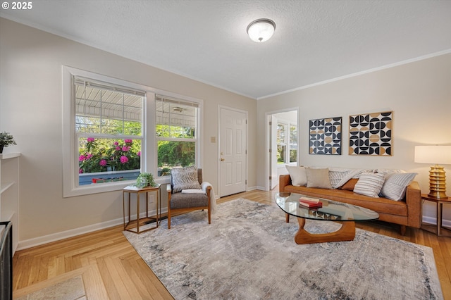 7817 N Washburne Ave, Portland, OR 97217 - living area with baseboards, ornamental molding, and a textured ceiling
