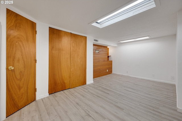 7817 N Washburne Ave, Portland, OR 97217 - unfurnished room featuring baseboards, visible vents, and wood finished floors