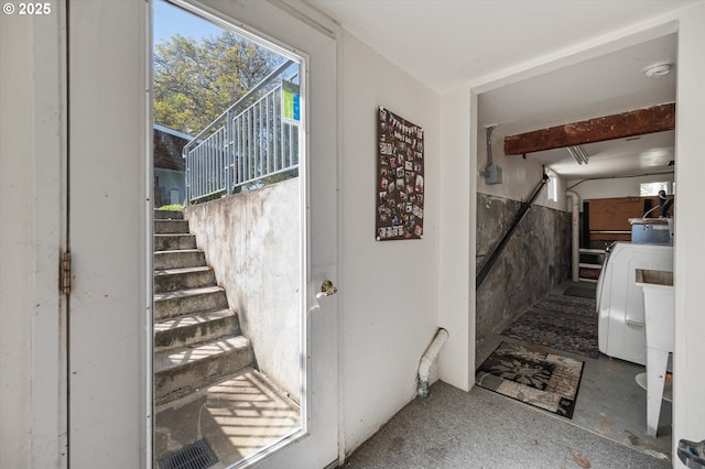 7817 N Washburne Ave, Portland, OR 97217 - stairs with washer / clothes dryer and concrete flooring