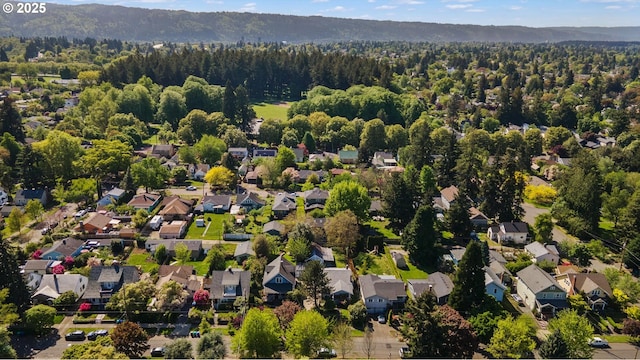 7817 N Washburne Ave, Portland, OR 97217 - drone / aerial view with a forest view, a residential view, and a mountain view