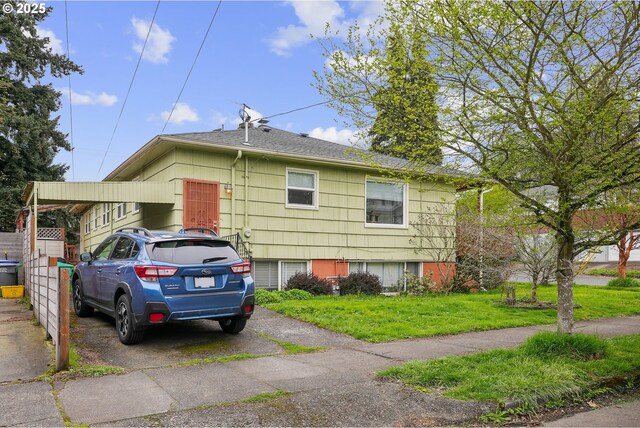 51055109 SE Tibbetts St, Portland, OR 97206 - view of home's exterior featuring a yard and a shingled roof